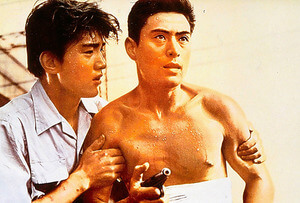 「太陽の墓場」より佐々木功(左)と津川雅彦(右)出典:www.asahi.com